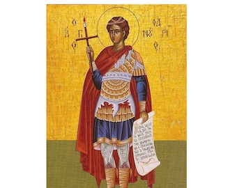 May include: A Byzantine icon depicting a saint holding a cross and a scroll. The saint is wearing a red robe over armor and has a gold halo. The background is gold with Greek text.