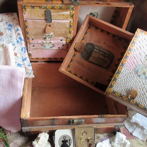 Amazing victorian doll trunk with contents, decoupaged, antique doll accessories, clothing, well loved, rare find, collector's dream,