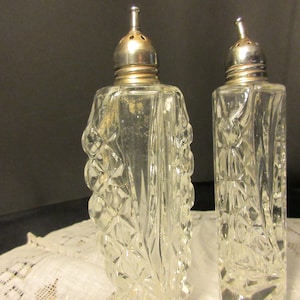 tall, elegant cut glass salt and pepper,antique, Edwardian, 1900's/1910's, silver plated tops, excellent condition, classy, classic, image 1