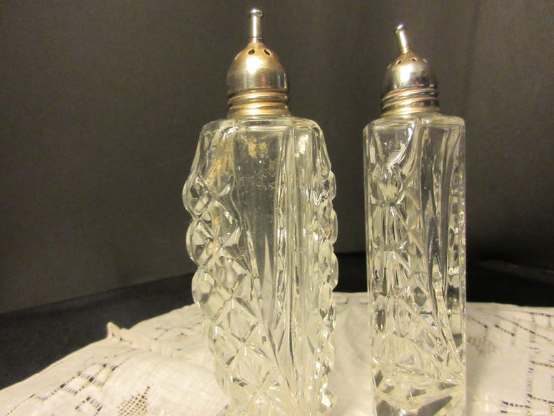 tall, elegant cut glass salt and pepper,antique, Edwardian, 1900's/1910's, silver plated tops, excellent condition, classy, classic, image 1