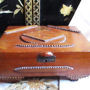 Tramp art cigar box, 193&#39;s wooden cigar box, royal warranted, His Majesty the King, embellished with hand carved layers, feet, velvet lining