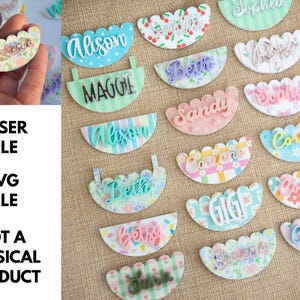 May include: A collection of colorful, scalloped-edge name tags with various names in cursive script. The tags feature floral, striped, and polka dot patterns. Text on the left side reads "LASER FILE", "SVG FILE", and "NOT A PHYSICAL PRODUCT".