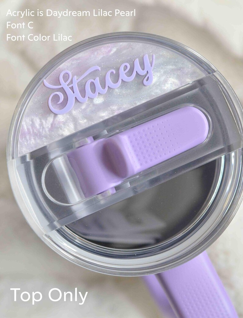 a close up of a purple watch with a plastic case