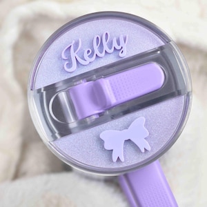 a close up of a hair dryer on a bed