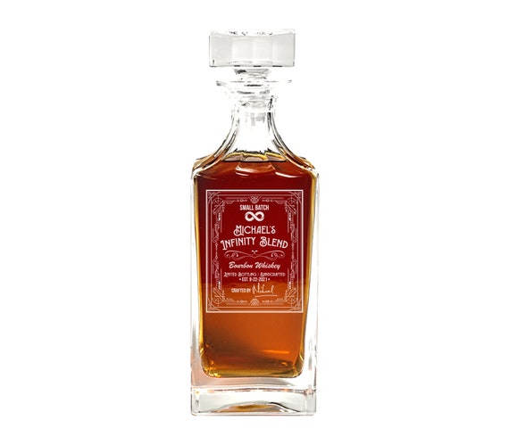 An 'Infinity Bottle' decanter — a blending tradition where you combine dregs of your best spirits over time — with a custom engraved label that tells your personal whiskey story.