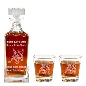 May include: A set of two clear glass whiskey glasses and a matching decanter, all engraved with a bull image and the text "TEXT LINE ONE TEXT LINE TWO TEXT LINE THREE TEXT LINE FOUR".
