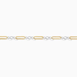 May include: A delicate chain necklace featuring alternating silver and gold-colored rectangular links. The gold links are evenly spaced along the chain, creating a subtle contrast against the silver links. The necklace is displayed against a white background.