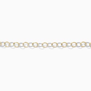 May include: A gold and silver chain necklace with alternating gold and silver-toned circular links. The necklace is displayed against a white background, highlighting the contrast between the two metal colors. The chain is a jewelry item.