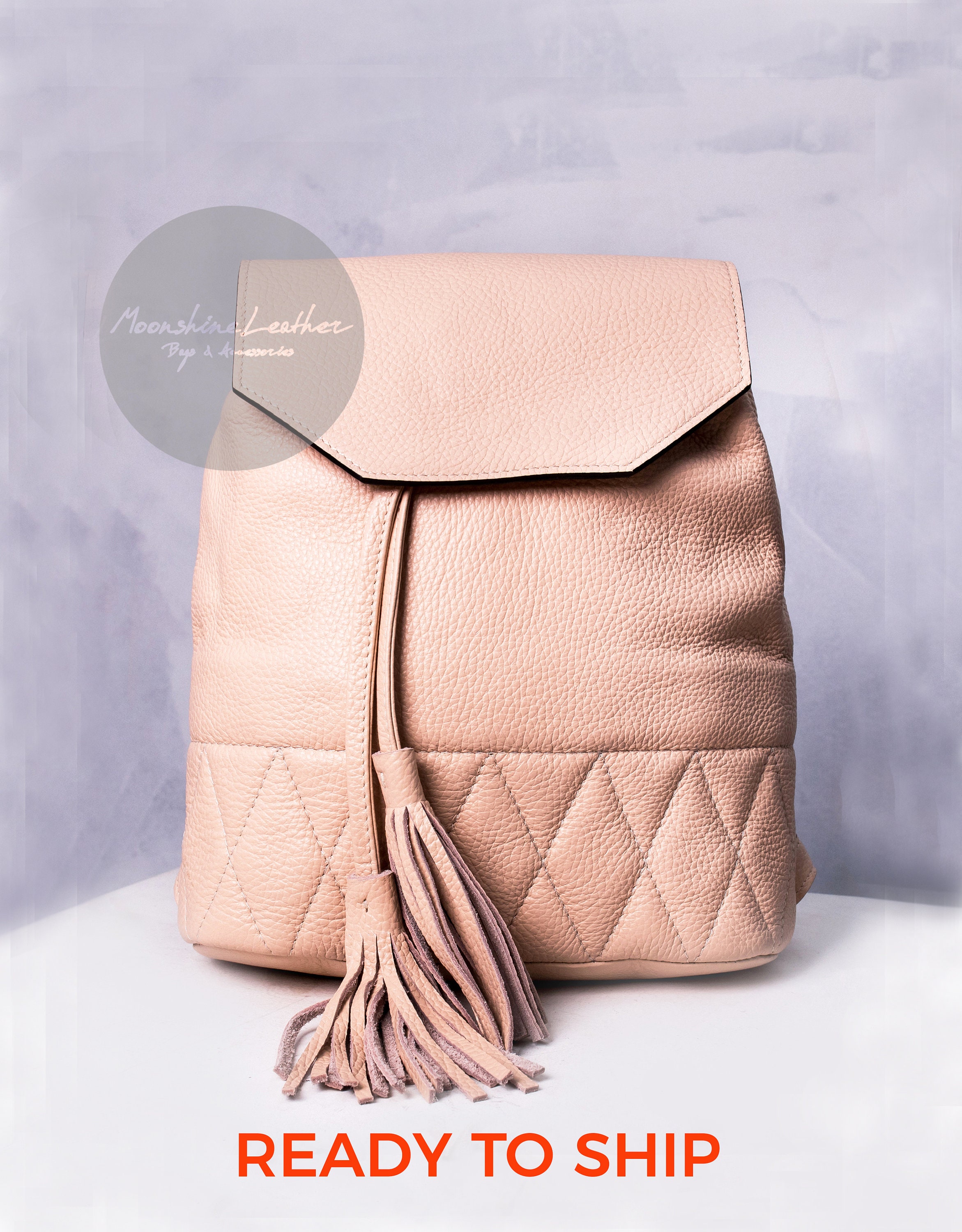 small pink backpack purse