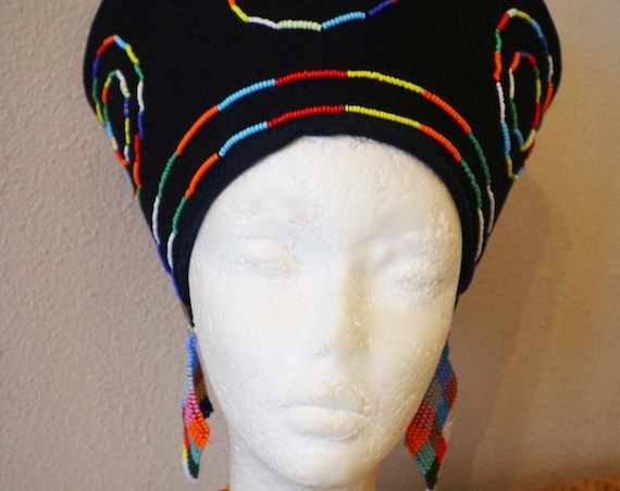 Handmade african hat. This hat will complete your outfit and give you the flair you were looking for.