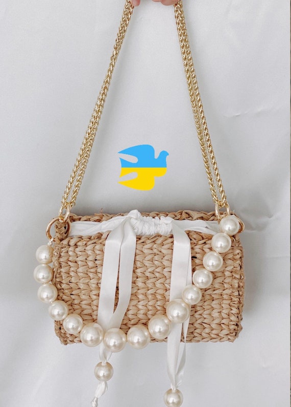 straw and pearl bag