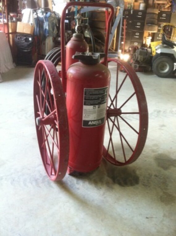 Items similar to Antique Fire Extinguisher on wheels on Etsy