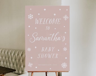 May include: A pink welcome sign with white snowflakes and the text "Welcome to Samantha's Baby Shower December 12th, 2023".