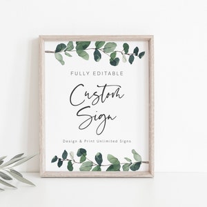 May include: A printable sign with a white background and a green eucalyptus leaf border. The text on the sign reads "FULLY EDITABLE Custom Sign Design & Print Unlimited Signs".