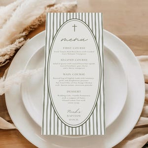 May include: A baptism menu card with a cross design at the top. The menu is printed on a white and green striped background. The menu includes the courses: First Course, Second Course, Main Course, and Dessert. The name "Noah's" and the date "10-01-20" are at the bottom.