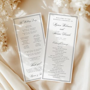 May include: Two wedding ceremony programs with black text on white paper. The programs have a dark blue border and include the names of the wedding party, the order of the ceremony, and the names of the bride and groom.