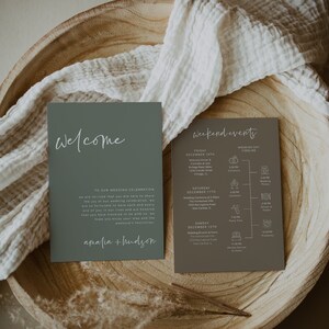 May include: A green and brown wedding invitation suite with the text "Welcome" and "Weekend Events". The invitation includes the names "Amalia + Hudson" and a wedding day timeline.