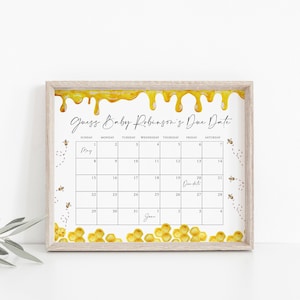 Può includere: Un gioco di baby shower stampabile a tema ape. Il gioco chiede agli ospiti di indovinare la data di nascita del bambino su un calendario con un motivo a nido d'ape e miele che cola.