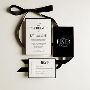 May include: Elegant wedding invitation suite with black and white stationery. The main invitation reads "The Wedding of Kayla & Mike" with event details. Includes RSVP and "The Finer Details" cards, all tied with a black ribbon.