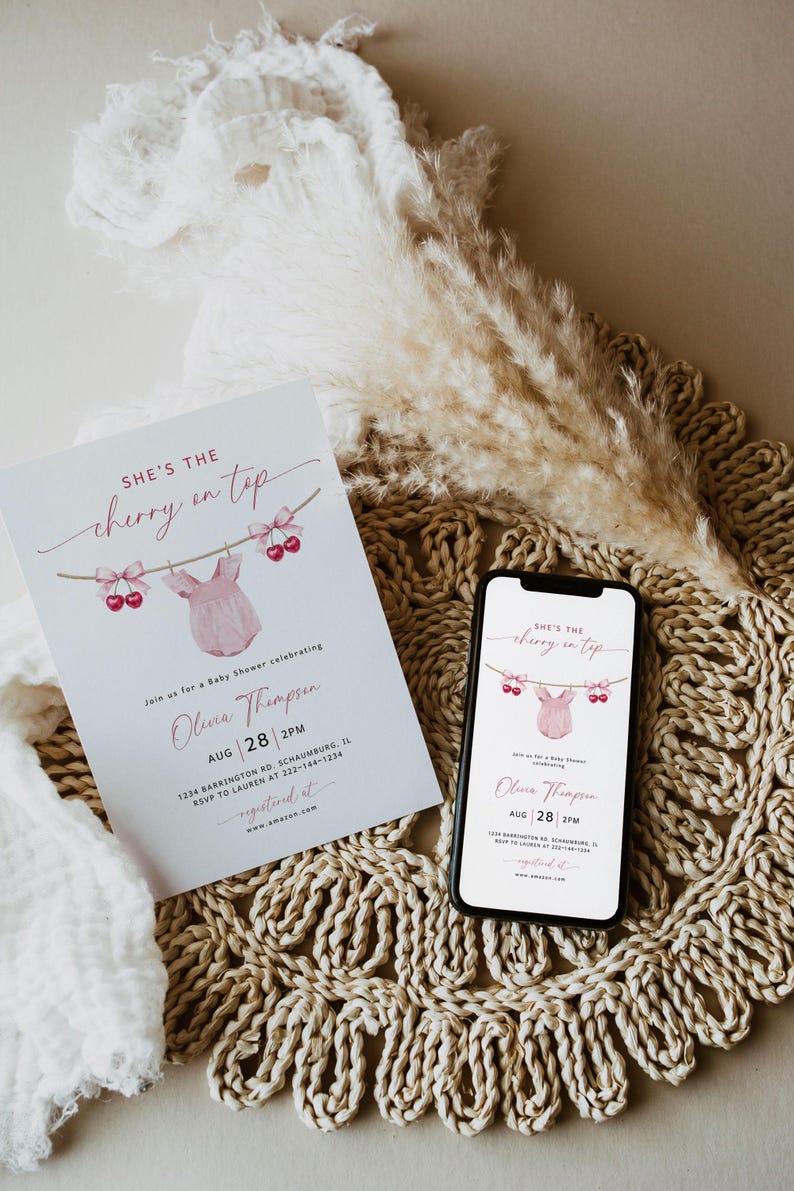 May include: A baby shower invitation with the text "She's the cherry on top" and a pink onesie illustration. The invitation is on a white card, and a smartphone displays the same design. The date is August 28th.