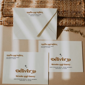 May include: A white envelope with a brown address label that reads "Amelia and Robert, 1234 Barrington Road, Chicago, IL 60150". A white card with a brown address label that reads "Deliver to Brooke and Davey, 4332 S Salem Drive, West Dundee, Chicago, IL 61150".