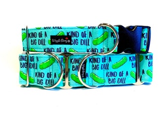 May include: A turquoise blue dog collar with silver hardware and a repeating pattern of green pickles and the text "Kind of a Big Dill".