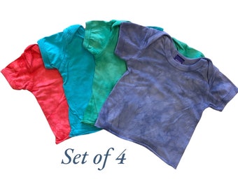 12 month hand dyed cotton baby t-shirts, made with low-impact dyes and safe for babies! Gender free, neutral. Dyed @ WaxonStudio (Asheville)