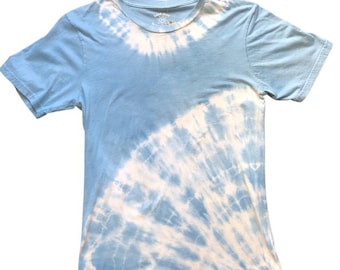 May include: A light blue tie-dye t-shirt with a crew neck and short sleeves. The shirt features a spiral tie-dye design in white and light blue. The shirt is made of a soft, comfortable material.