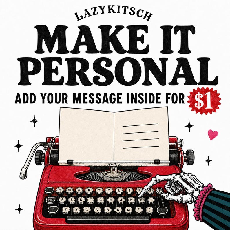 May include: A red typewriter with a skeleton hand pressing a key. Above it, the text reads LAZYKITSCH MAKE IT PERSONAL ADD YOUR MESSAGE INSIDE. The illustration includes a blank card, small black stars, and a pink heart on a white background.