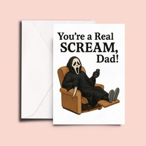 May include: Greeting card with a humorous illustration of the Scream character in a recliner, holding a knife and a remote control. The text reads "You're a Real SCREAM, Dad!" The card is inside a white envelope.