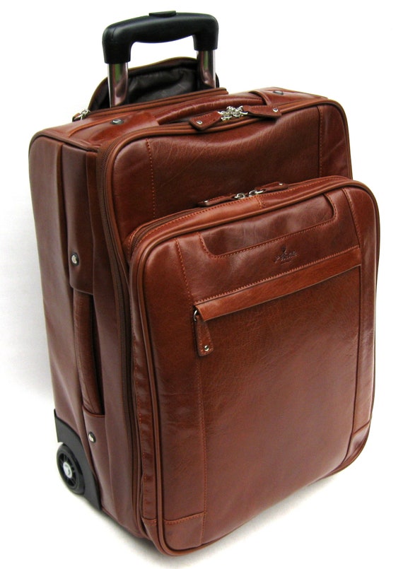 tan leather suitcase