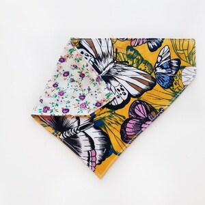 Handmade reversible slide-on doggy bandana in your choice of over 60 fabrics!