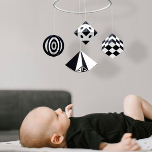 Black and white mobile baby for newborn gift. Geometric crib mobile. High contrast Montessori toy for hanging over the crib