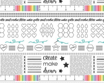 May include: A white fabric with a repeating pattern of sewing-themed elements. The design includes text that says "create make dream", along with stars, hearts, and geometric shapes. A ruler with inch measurements is also present.