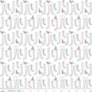 May include: A repeating pattern of illustrated legs, stockings, and sprigs of holly on a white background. The legs and stockings are in shades of pink, blue, and white. The image is measured in inches.