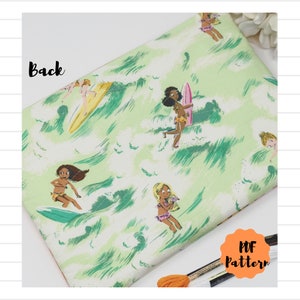 May include: A green and white fabric with a repeating pattern of girls surfing on waves. The fabric has the words "PDF Pattern" printed on it.