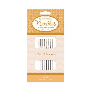 May include: A packet of cross-stitch needles. The packaging is tan and orange with the words "Cross-Stitch Needles". The packet contains a set of 8 needles, size #24, measuring 3.69cm x 0.08cm.