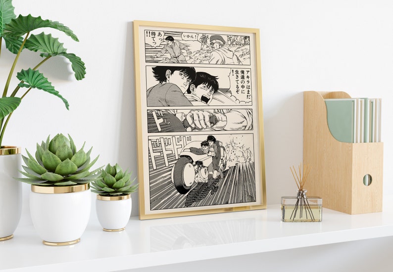May include: A black and white manga print featuring a scene of two characters riding a motorcycle. The text in the image reads "!!待あ" and "いかん!" and "アキラはまだ" and "俺達の中に" and "生きてるぞ".