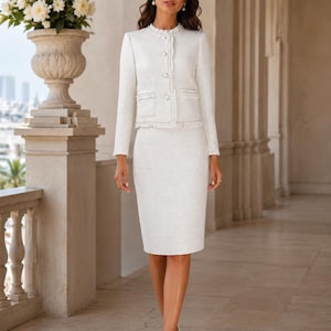 Luxury white boucle skirt suit with sparkling texture and pearl buttons, elegant women’s two-piece set for weddings, parties, office and special occasions.