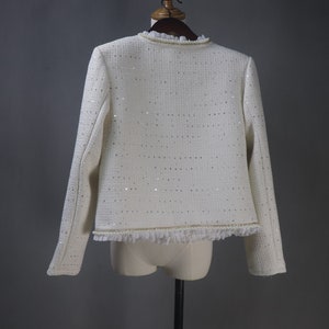 Back view of custom white sequin jacket with pearl and chain trim – elegant women’s formal jacket for weddings, graduations, and evening events