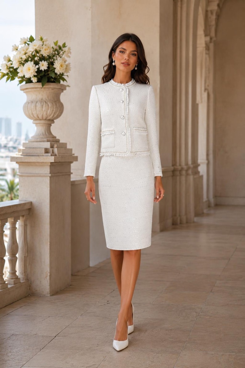 Luxury white boucle skirt suit with sparkling texture and pearl buttons, elegant women’s two-piece set for weddings, parties, office and special occasions.