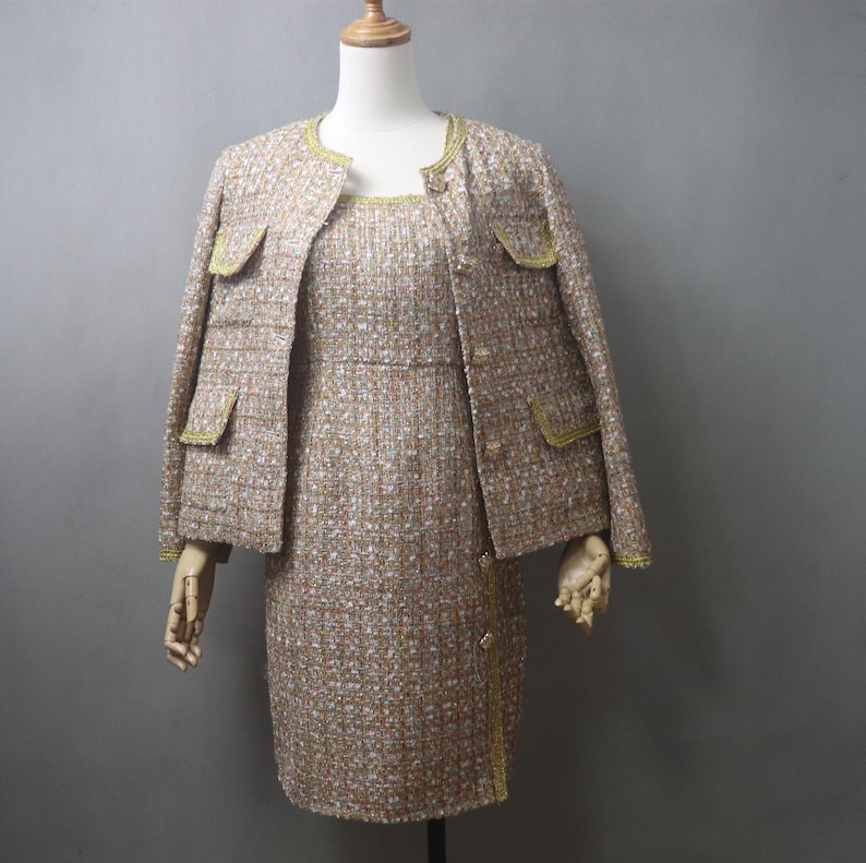 Custom made pastel tweed skirt suit on mannequin, women’s boucle jacket and sheath dress set with gold trim, tailored two piece outfit, available in any size and any length