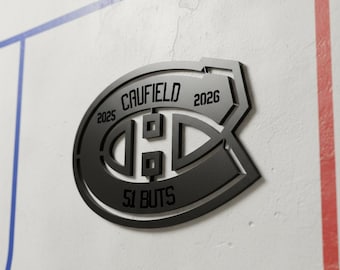 Découpe laser fait de bois en mémoire du 51e but de la saison 2025-2026 de Cole Caufield.