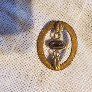 Vintage amethyst and gold brooch