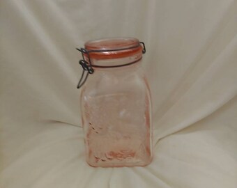 Vintage cranberry glass jar, cranberry glass jar, vintage jar, cranberry glass jar.