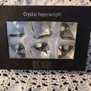 Vintage set of six  Oleg Cassini small Crystal paperweights.