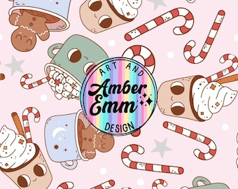 May include: A pink background with a repeating pattern of mugs of hot chocolate, gingerbread men, candy canes, and whipped cream. The mugs have cute faces and are decorated with stars and moons. The text "Art and Amber Emm Design" is in a circle with a rainbow background.