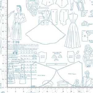 May include: A white fabric with a light blue vintage dress pattern. The design includes dress illustrations, pattern pieces, and text with measurements. The fabric is suitable for sewing projects.