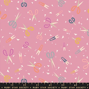 May include: Pink fabric with a repeating pattern of scissors in various colors, including blue, orange, yellow, and purple. White triangular shapes are scattered across the background. The text "RUBY STAR SOCIETY" is at the bottom.