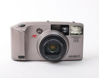 エメラルーダ　プロモ Minolta Freedom Zoom 140EX Panorama Date 38-140mm Lens Compact